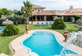 this magnificent image shows the extent of the property: huge and elegant villa, an immense garden and spectacular pool